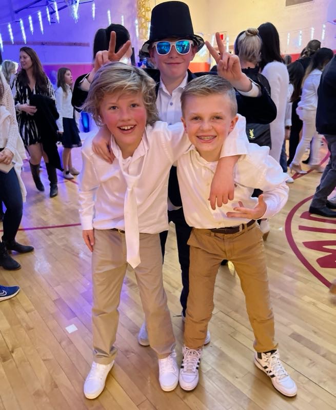 Hamish celebrating with friends at a party